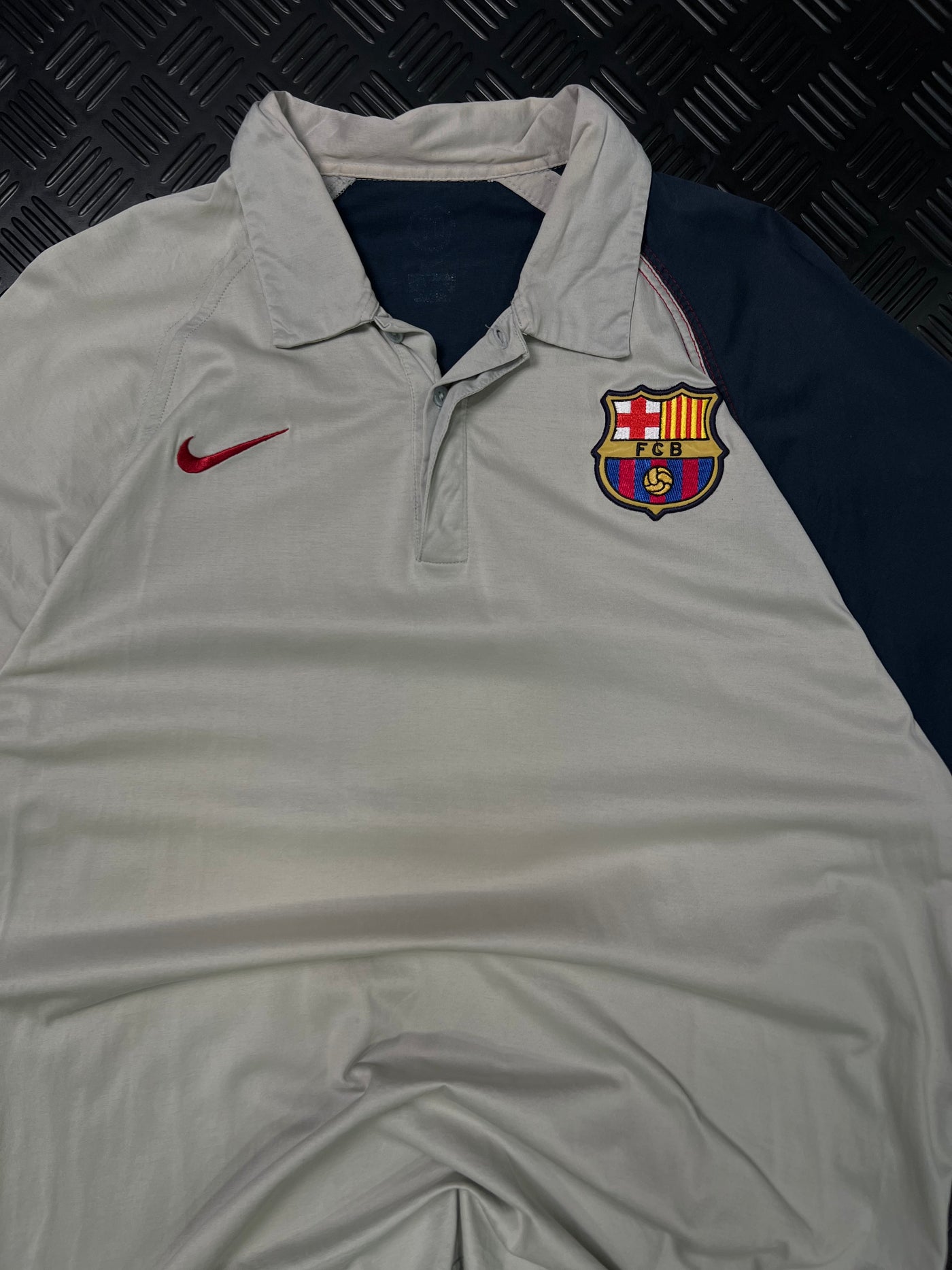 Detalle frontal de polo Nike FC Barcelona