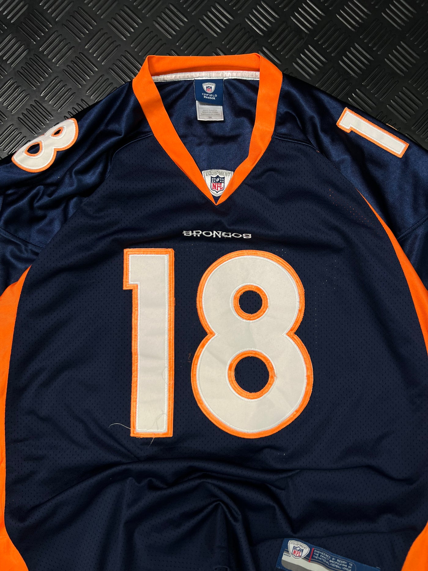 Detalle de camiseta NFL Reebok Denver Broncos Peyton Manning talla 54