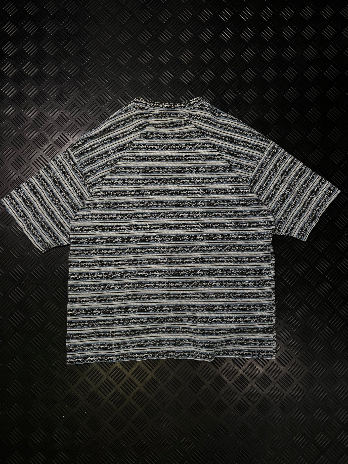 Vista trasera de camiseta Quiksilver estampada vintage