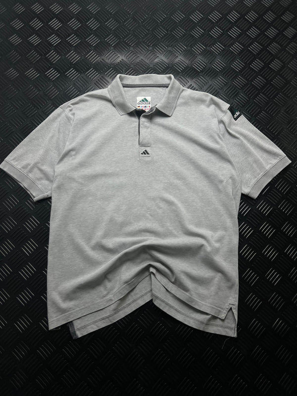 Vista frontal de polo Adidas Equipment vintage gris