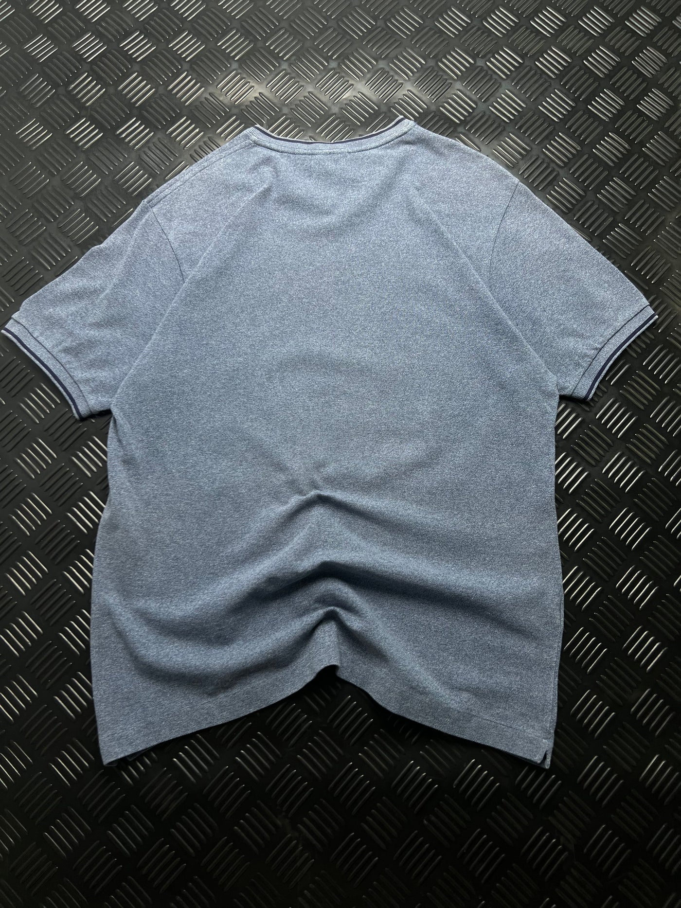 Vista trasera de camiseta Lacoste vintage