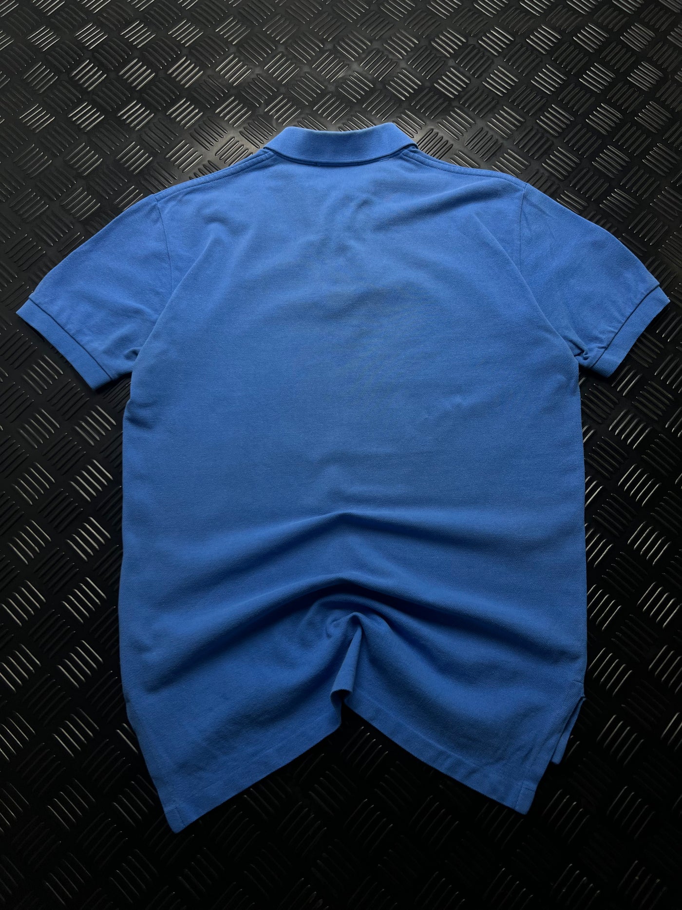 Vista trasera de polo Ralph Lauren azul