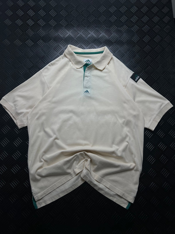 Vista frontal de polo Adidas Equipment blanco vintage
