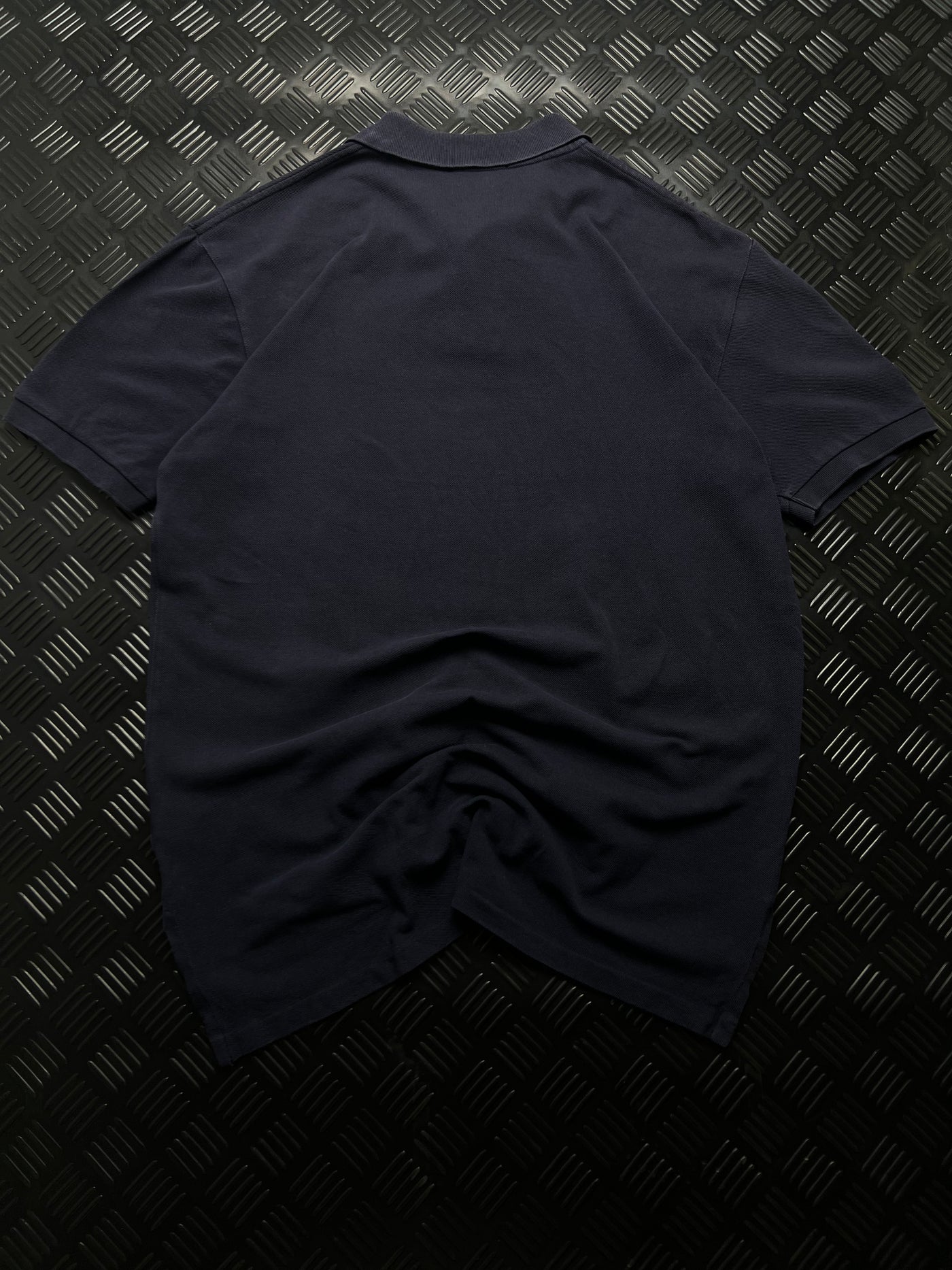 Vista trasera de polo Ralph Lauren azul marino