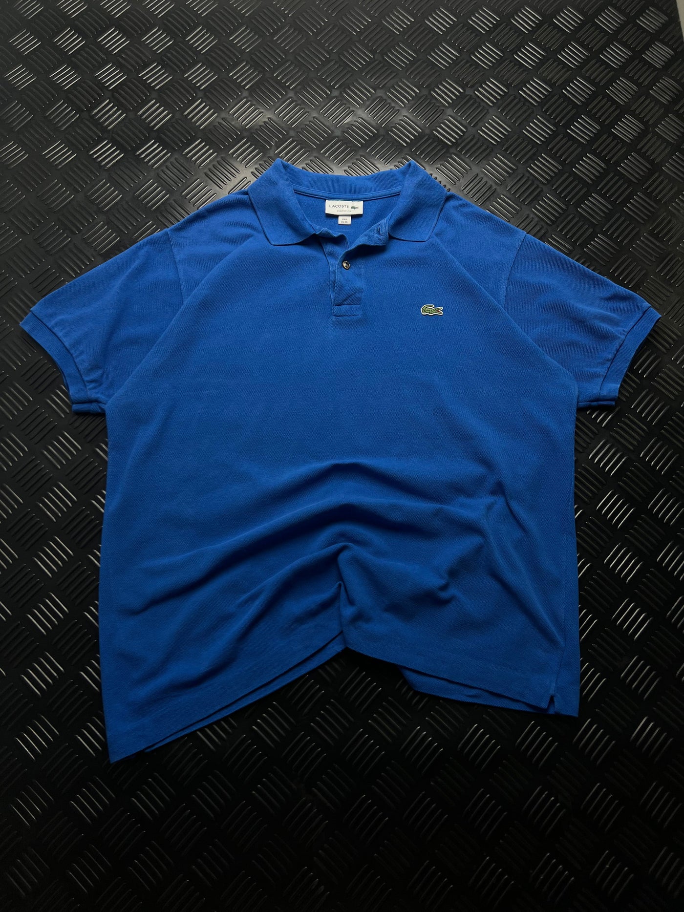 Vista frontal de polo Lacoste Classic Fit azul