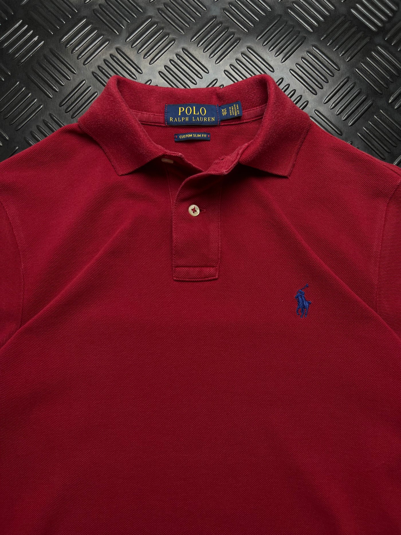 Detalle de etiqueta talla XS y Pony Ralph Lauren