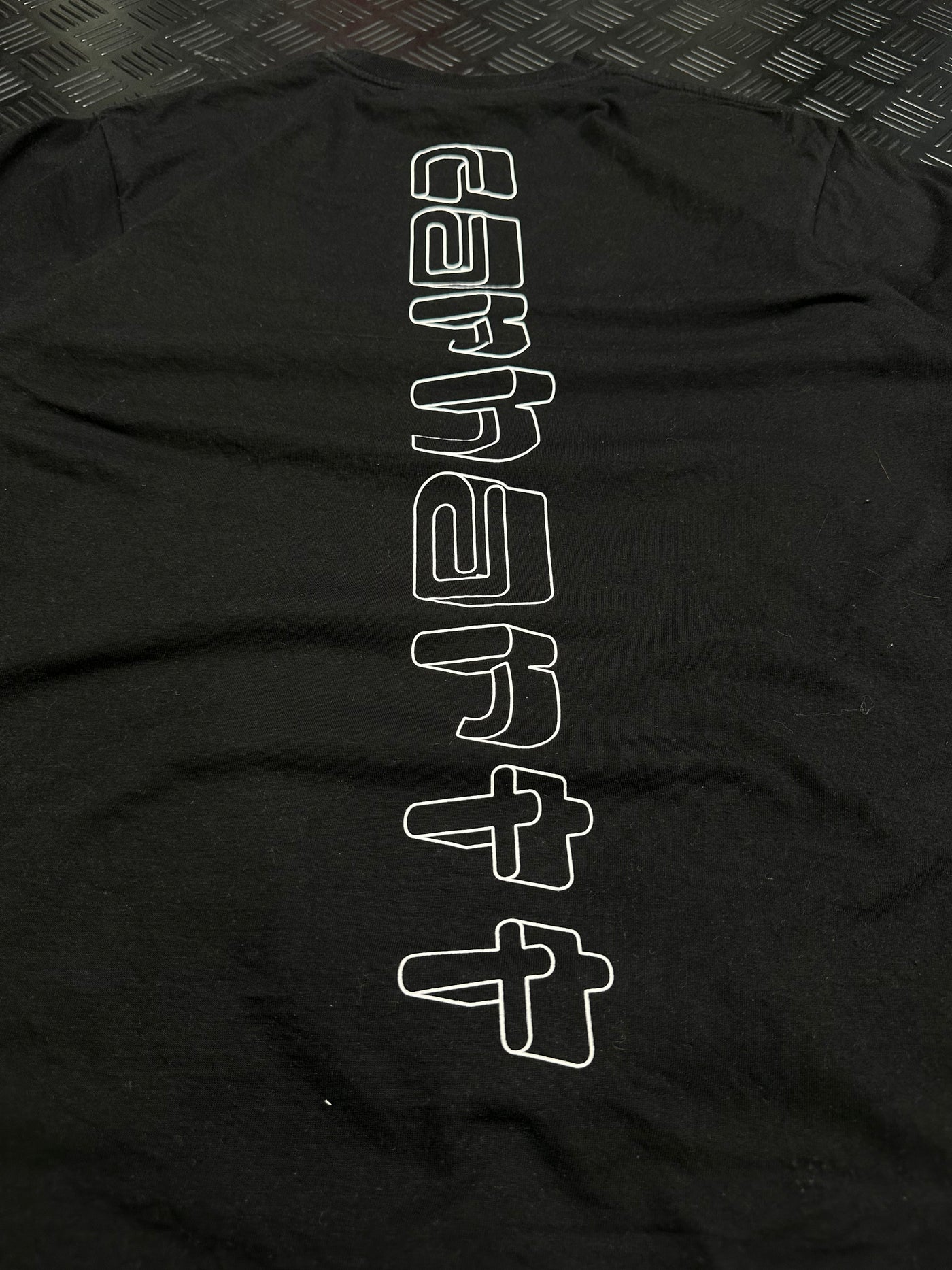 Detalle de gran logotipo trasero Carhartt