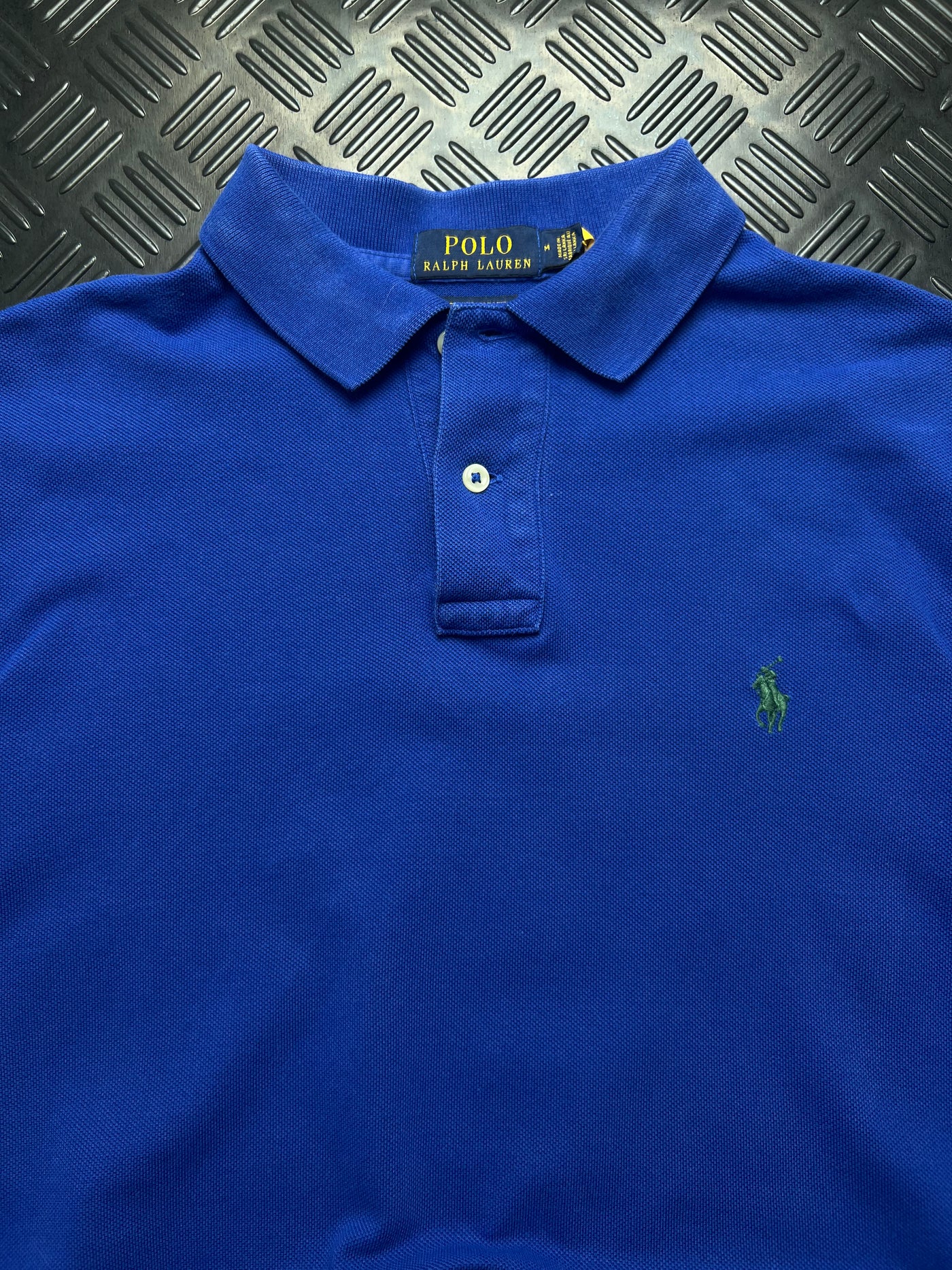 Detalle de polo ralph lauren classic fit azul