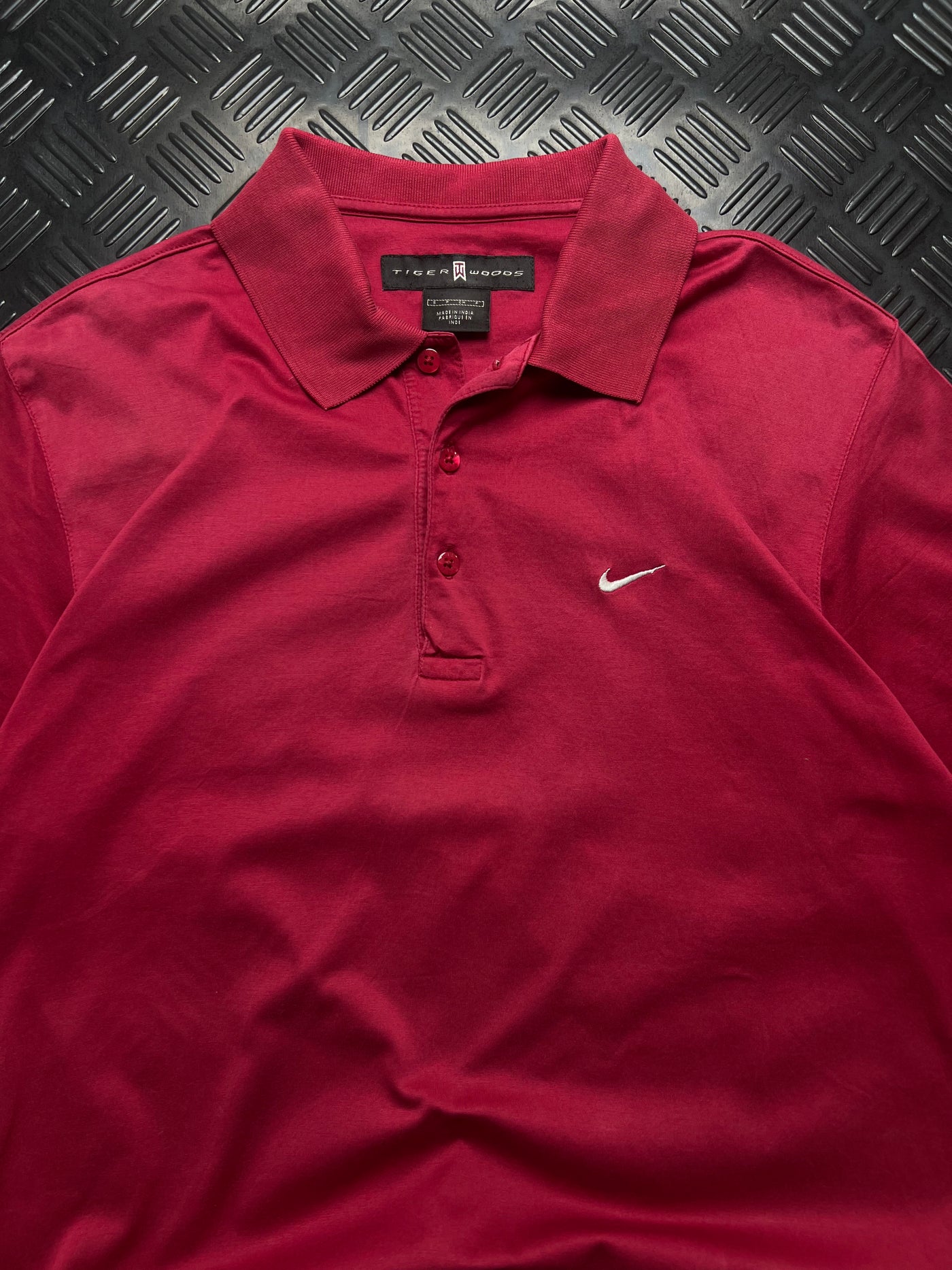 Detalle de polo nike tiger woods vintage