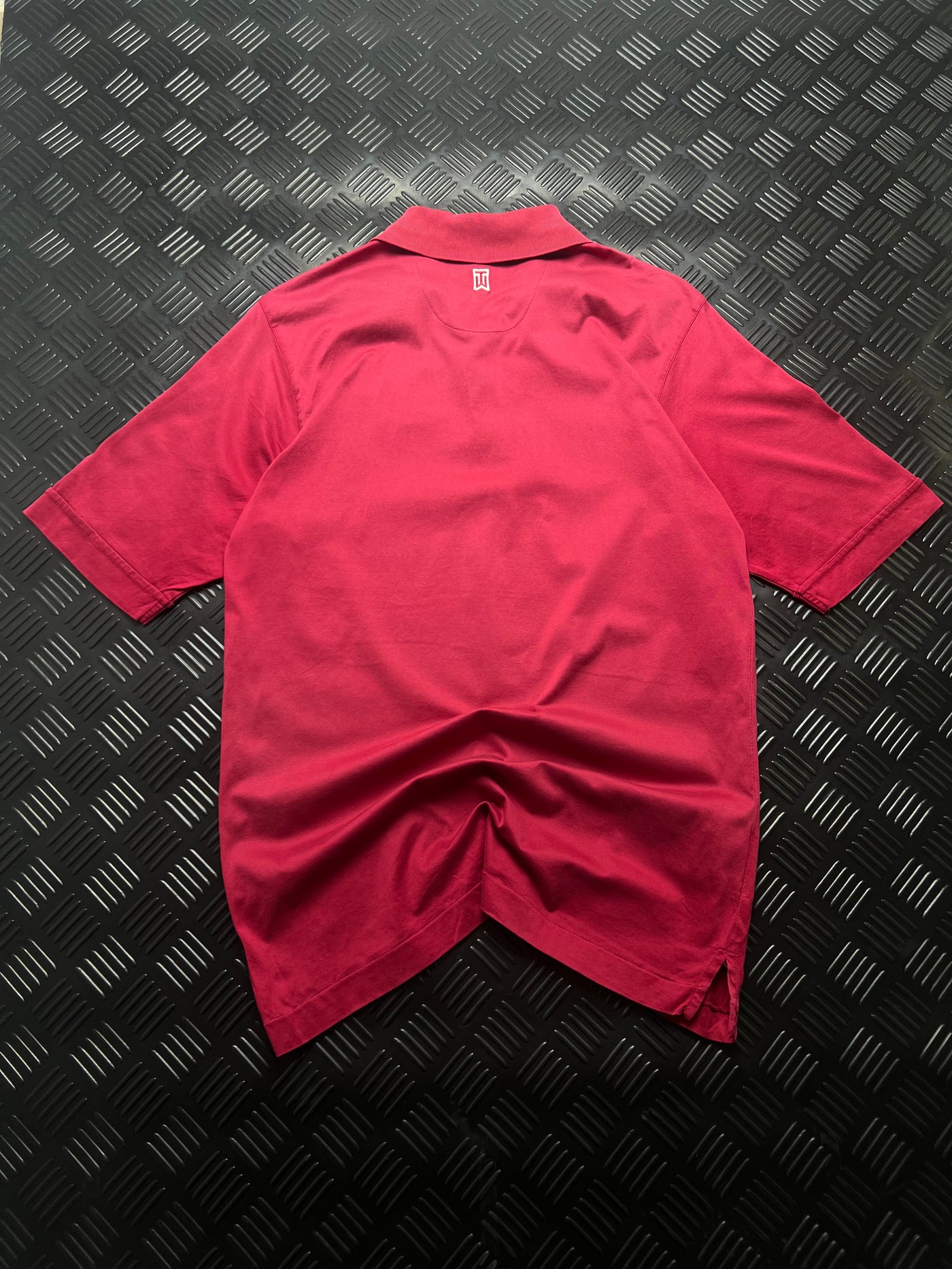 Detalle de polo nike tiger woods vintage