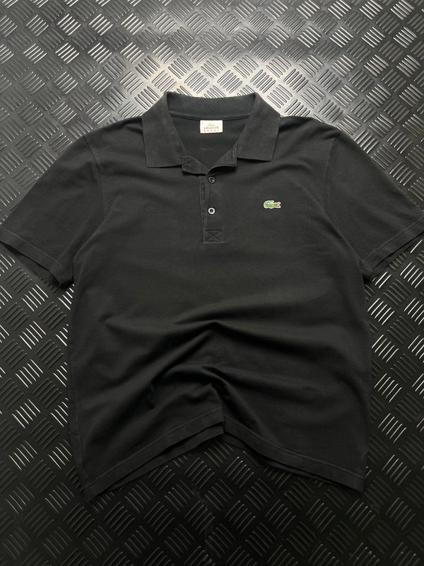 Vista frontal de polo lacoste sport negro