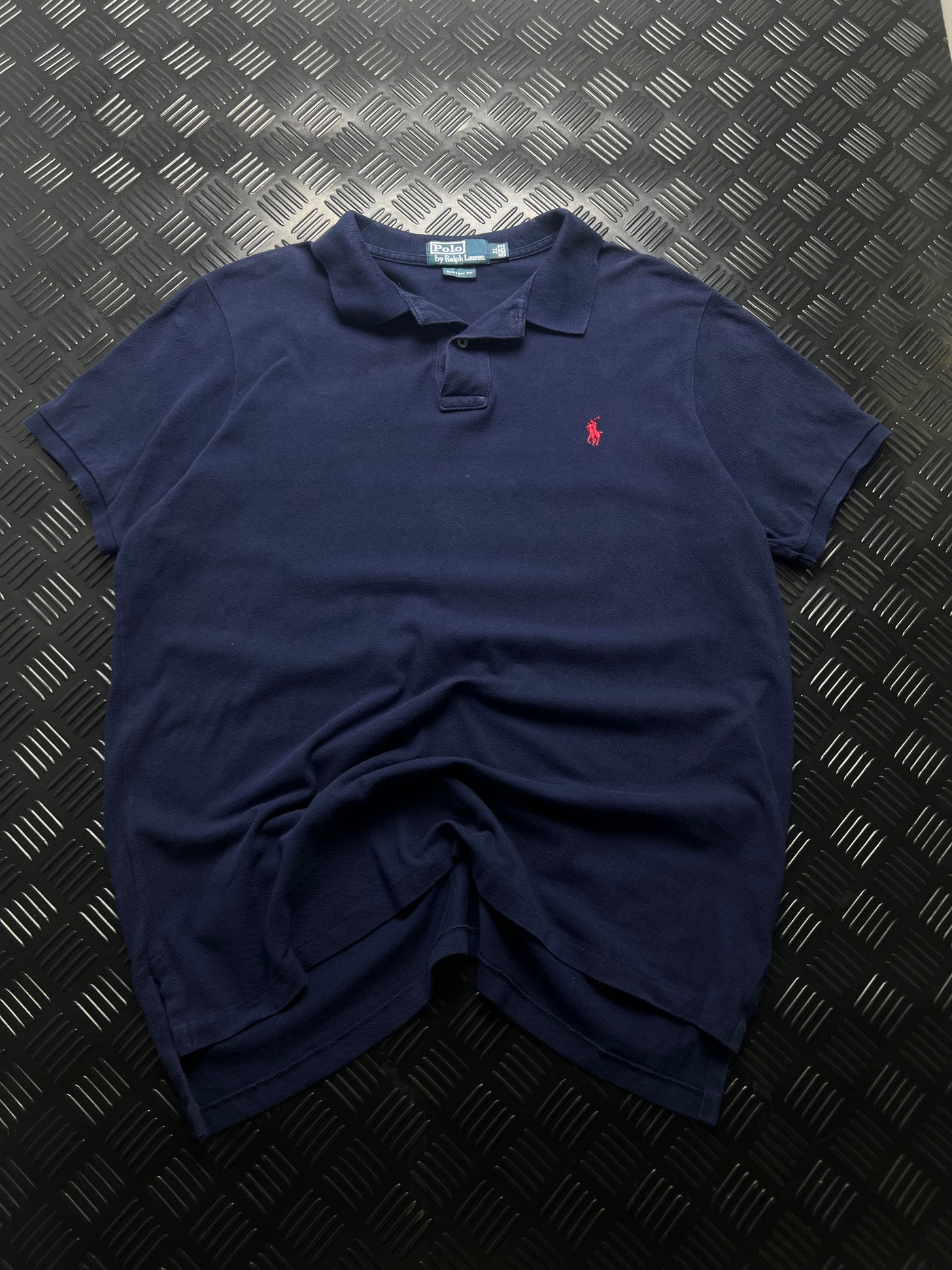 Vista frontal de polo ralph lauren custom fit azul marino