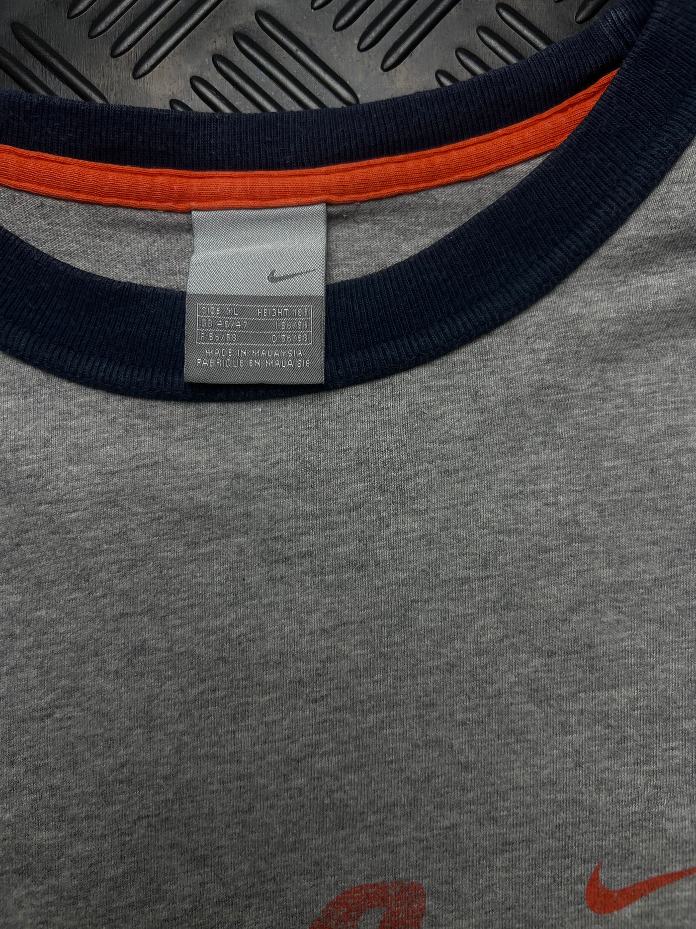 Detalle de camiseta nike west coast vintage