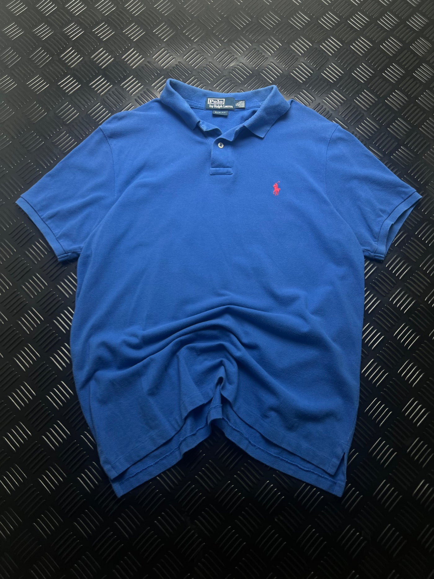 Vista frontal de polo ralph lauren slim fit azul