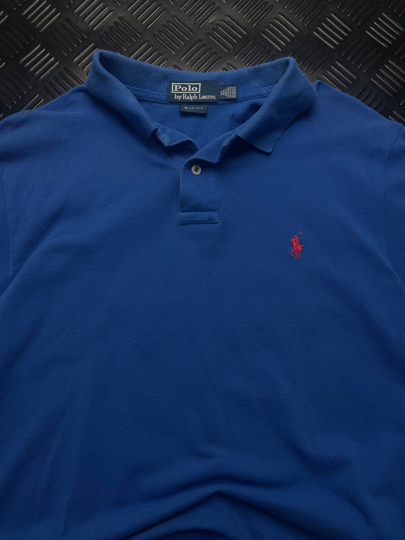 Detalle de polo ralph lauren slim fit azul