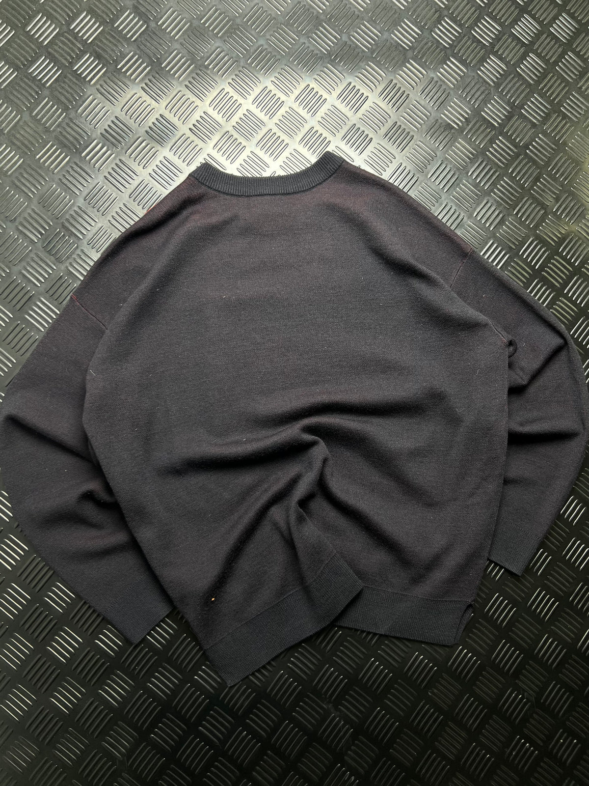 Emporio Armani: Jersey negro con águila roja