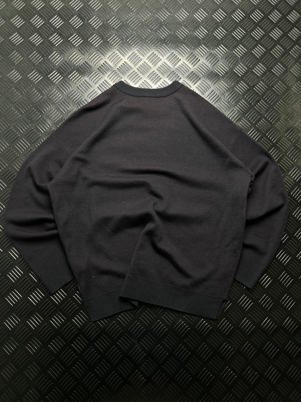 Emporio Armani: Jersey negro con águila roja