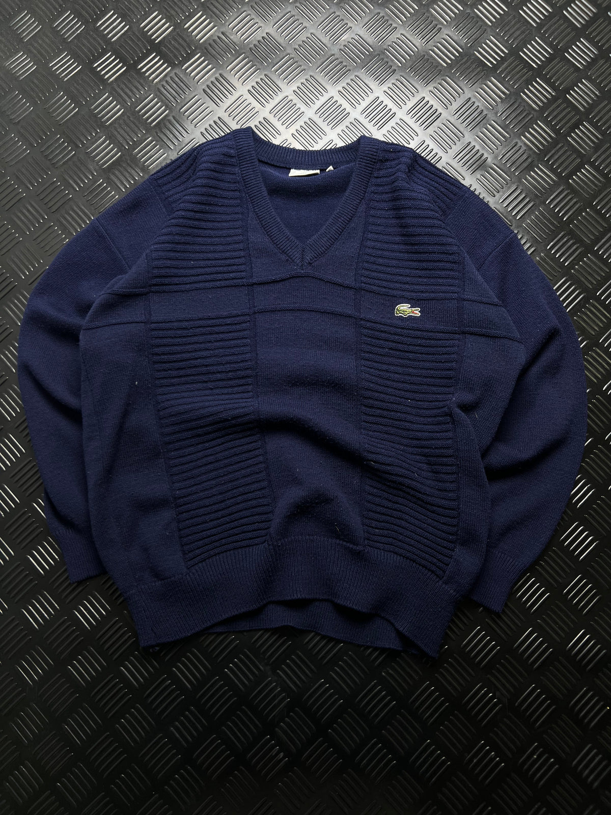 Lacoste: Jersey azul marino de punto con cuello de pico