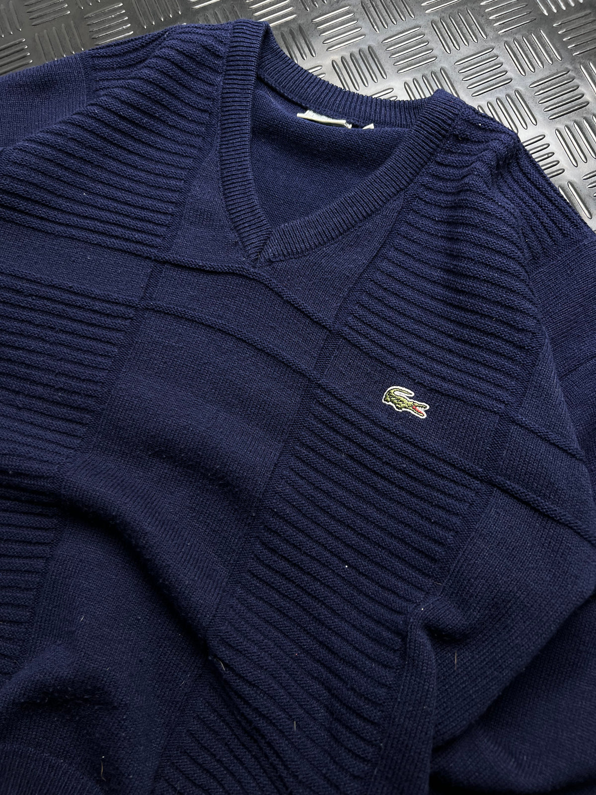Lacoste: Jersey azul marino de punto con cuello de pico