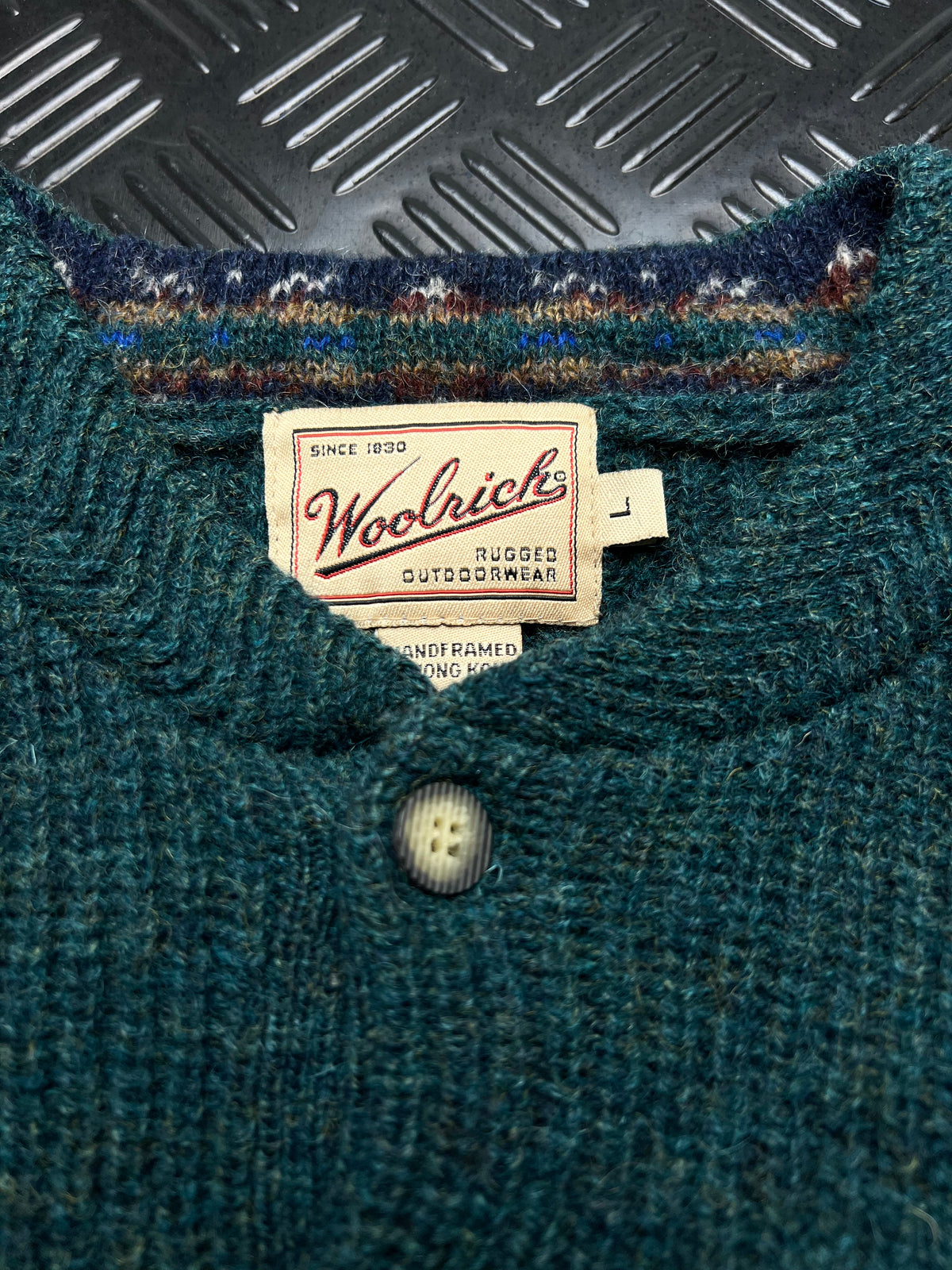 Woolrich: Jersey verde de punto con botones en cuello