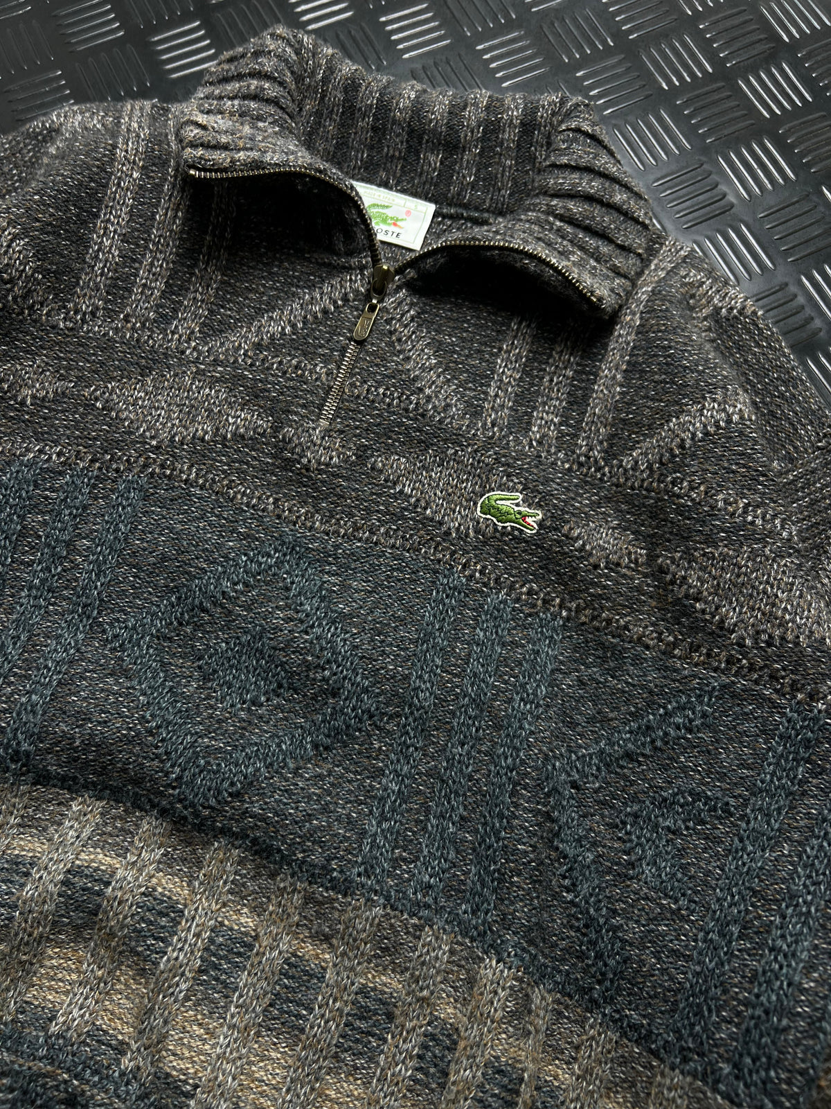 Lacoste: Jersey jaspeado gris con motivos y media cremallera