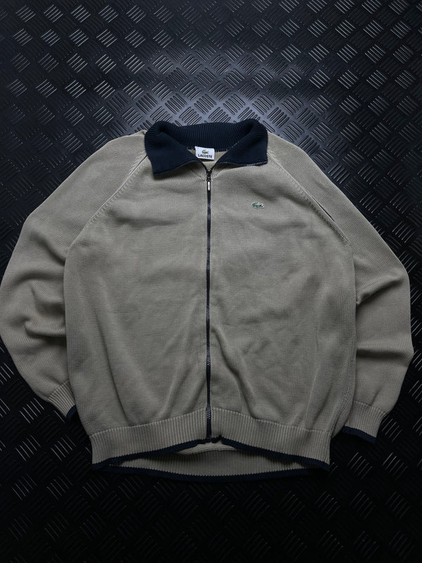 Lacoste: Chaqueta beige con cremallera y cuello azul marino