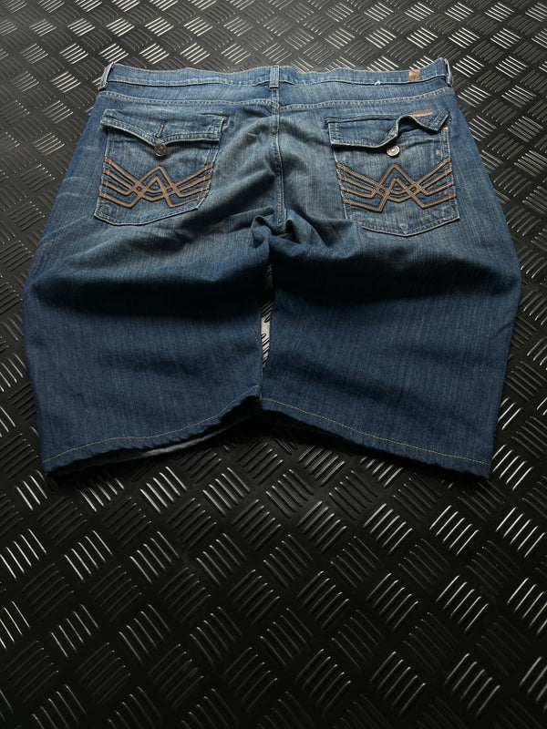 BERMUDAS VAQUERAS CON BORDADOS 7 FOR ALL MANKIND · AZUL — vista trasera