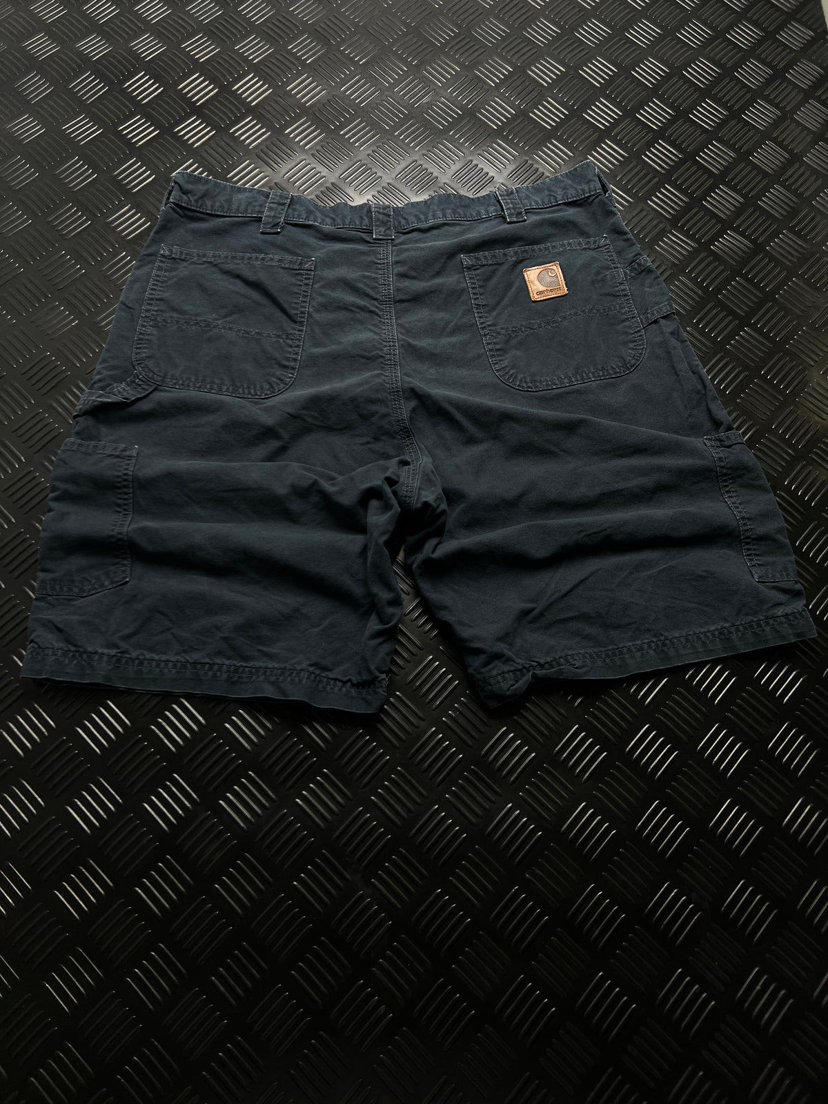 BERMUDAS B147 CARHARTT · AZUL MARINO — vista trasera