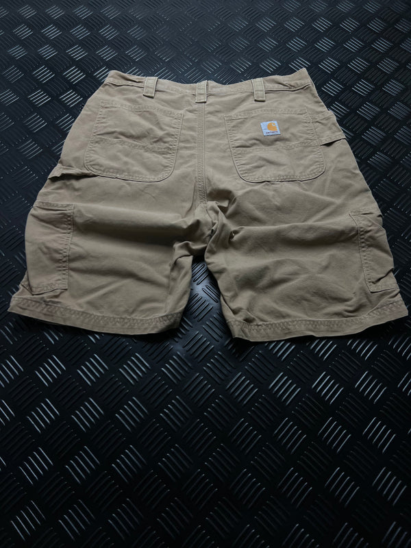 BERMUDAS ORIGINAL FIT B147 DKH CARHARTT · CAQUI — vista trasera