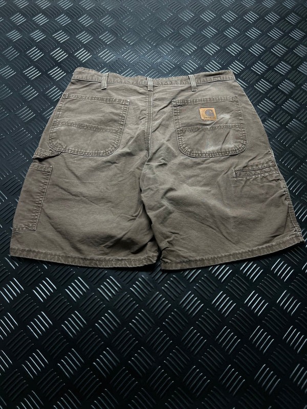 BERMUDAS CARHARTT · VERDE OLIVA — vista trasera