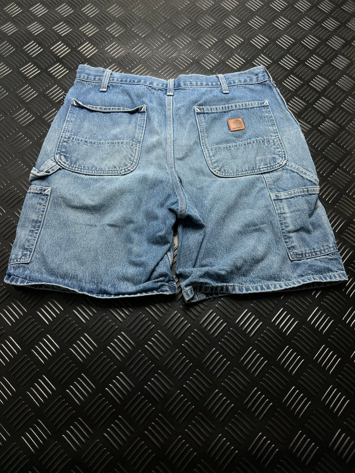 BERMUDAS VAQUERAS CARPENTER CARHARTT · AZUL — vista trasera