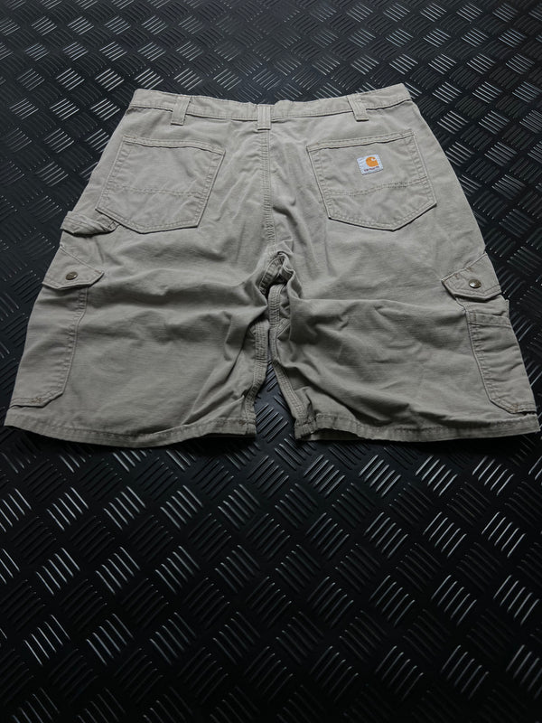 BERMUDAS CARGO B357-DES RELAXED FIT CARHARTT · BEIGE — vista trasera