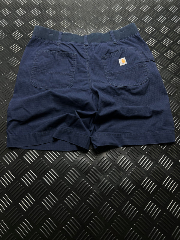 BERMUDAS ORIGINAL FIT CARHARTT · AZUL MARINO — vista trasera